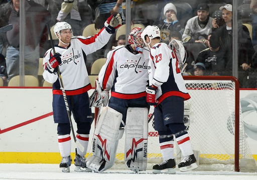 Karl Alzner, Michal Neuvirth, Scott Hannan