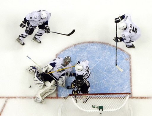 Dwayne Roloson, Martin St. Louis, Chris Kunitz