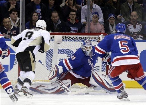 Pascal Dupuis, Henrik Lundqvist, Dan Girardi