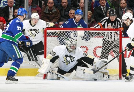 Henrik Sedin, Jussi Jokinen, Marc-Andre Fleury